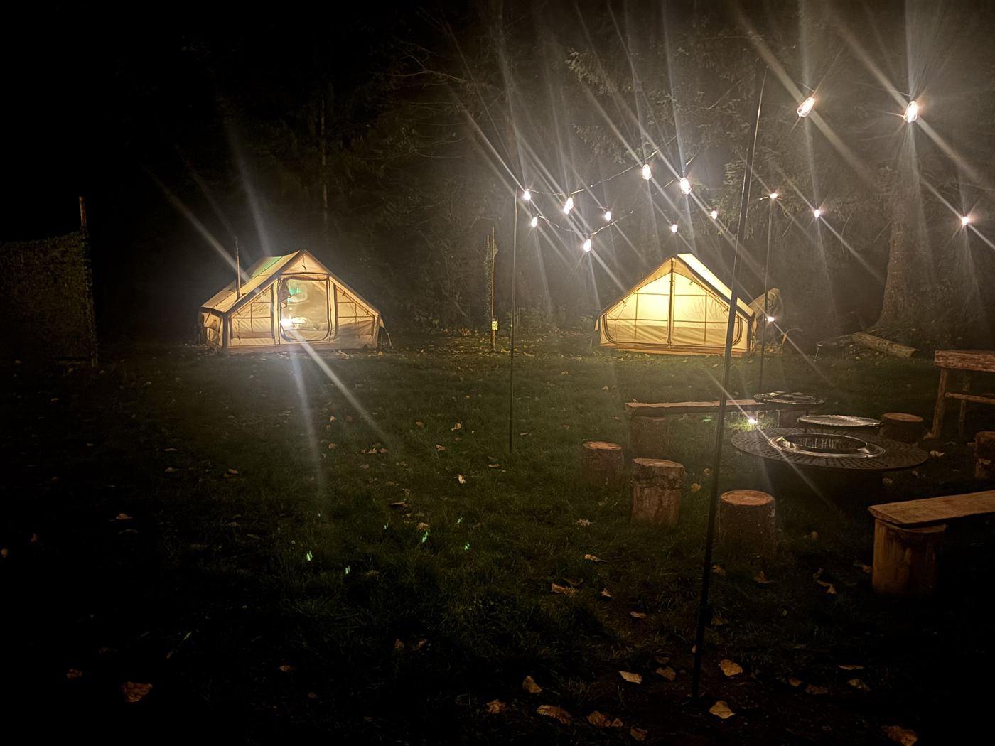 Glamping tents at night
